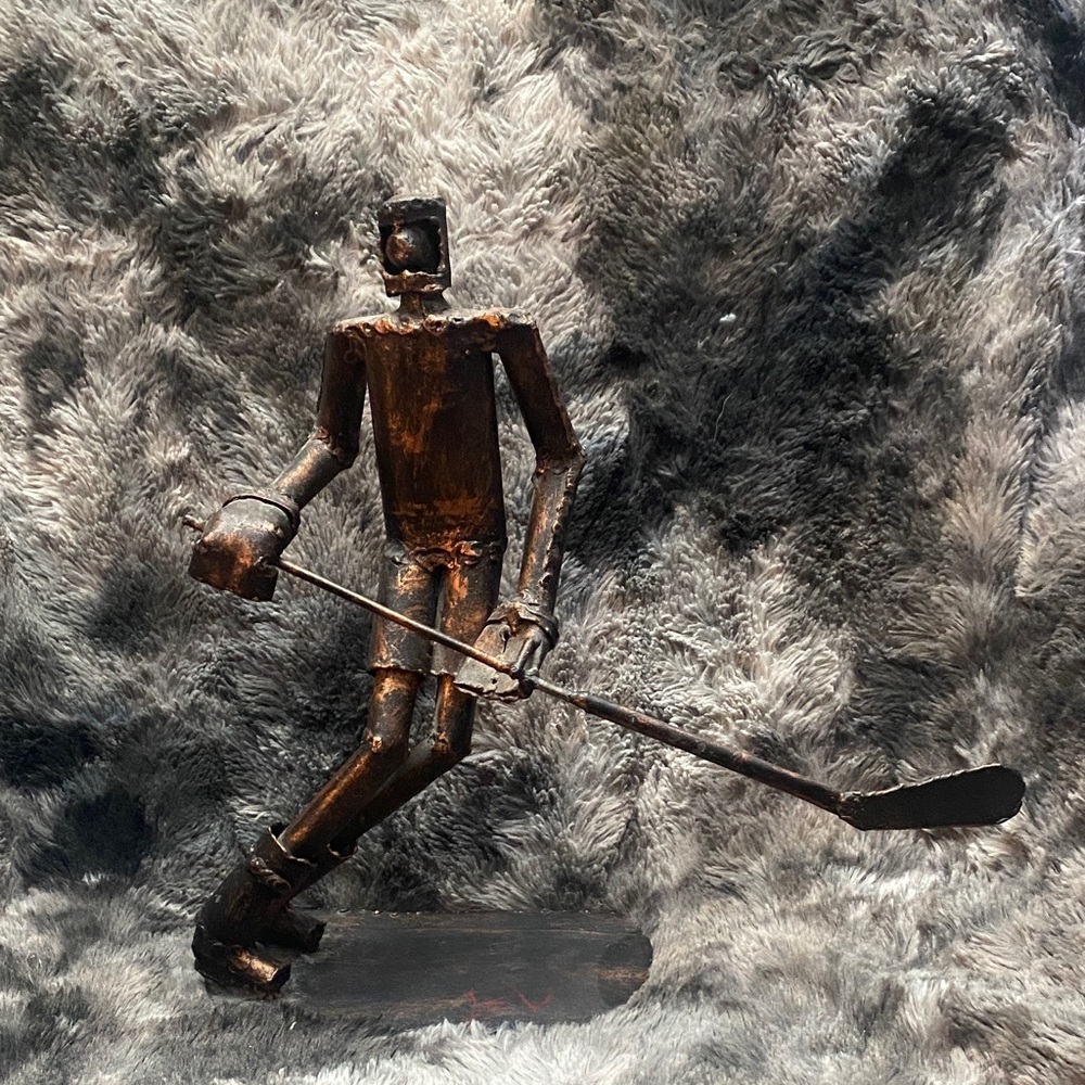 Rustic Metal Hockey Player Sculpture